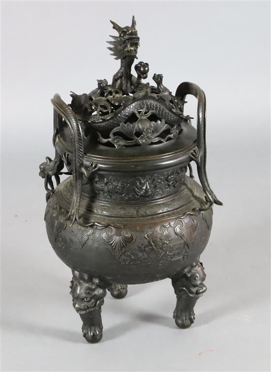 A rare Chinese archaistic bronze censer and cover, Xuande fifteen character mark but 19th century, H. 62.5cm
